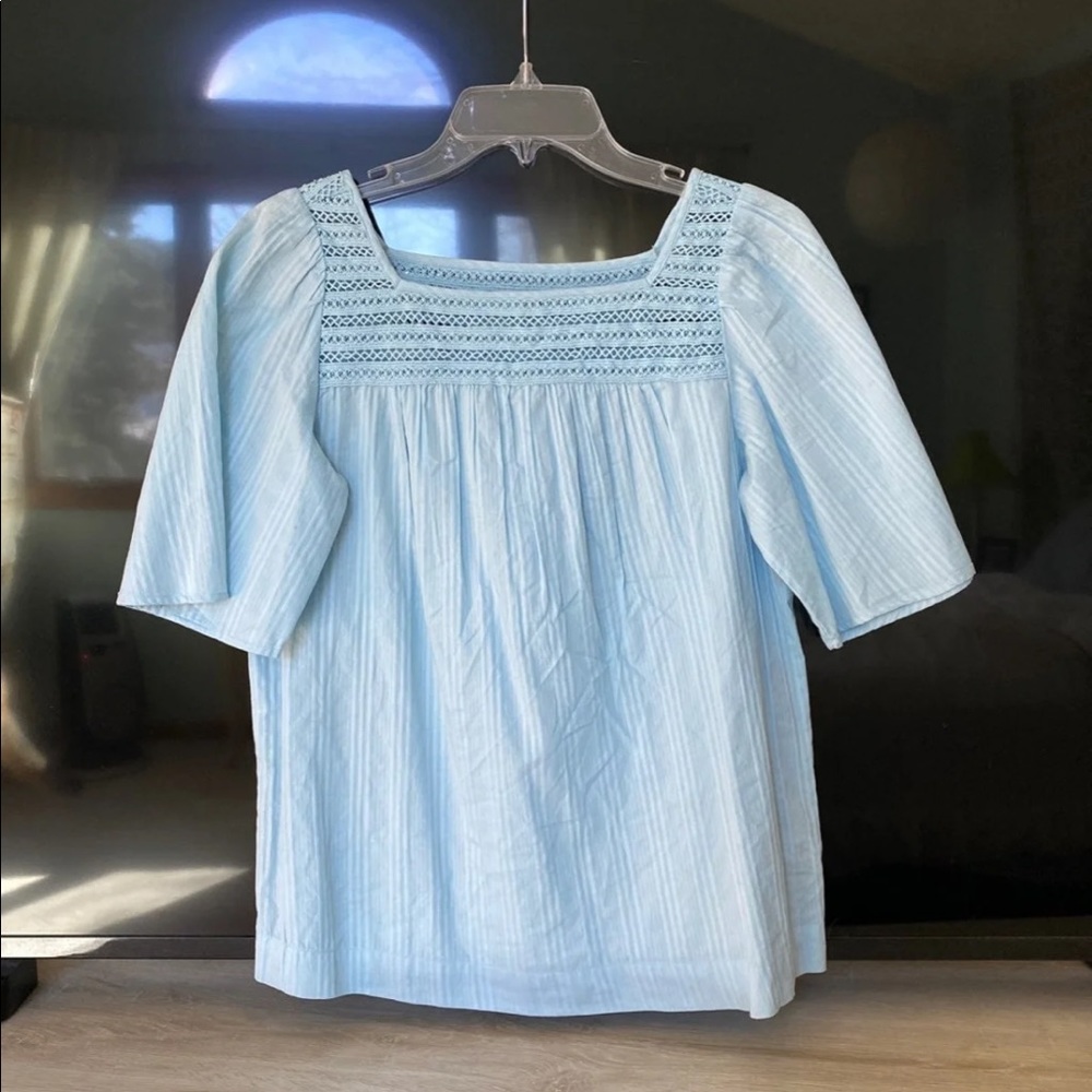 Light blue top